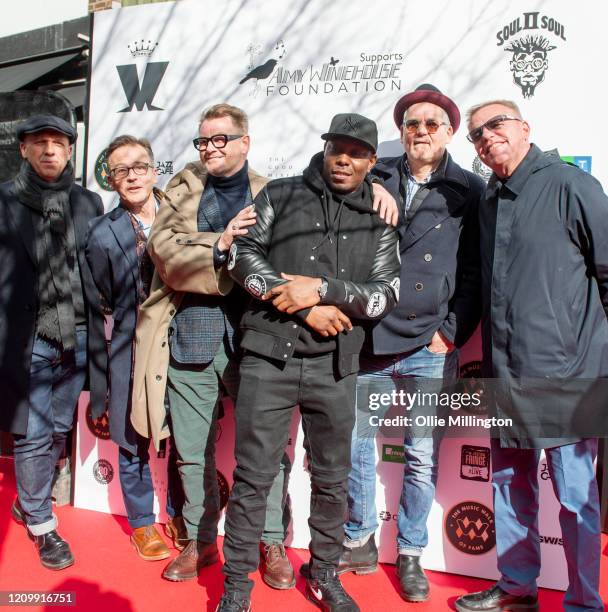 Mark Bedford, Dan Woodgate, Chas Smash, Dizzie Rascal, Mike Barson and Graham McPherson aka Suggs of Madness during their Music Walk Of Fame Stone...