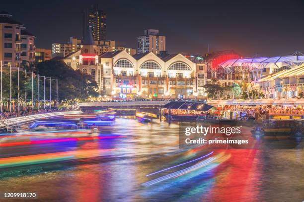 clark quay district wide angle shot singapore's famous view of around marina bay district a popular tourist attraction of singapore. - quayside stock pictures, royalty-free photos & images