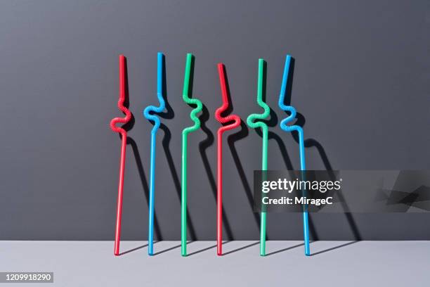 s-shape colorful drinking straws - menschliche erzeugnisse stock-fotos und bilder