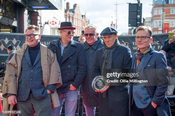 Chas Smash, Mike Barson, Graham McPherson aka Suggs, Mark Bedford and Dan Woodgate of Madness during their Music Walk Of Fame stone unveiling, the...