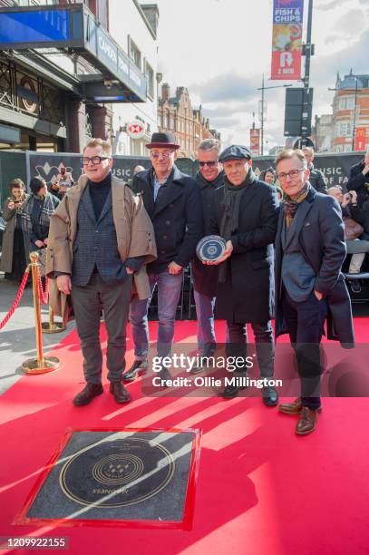 Chas Smash, Mike Barson, Graham McPherson aka Suggs, Mark Bedford and Dan Woodgate of Madness during their Music Walk Of Fame stone unveiling, the...