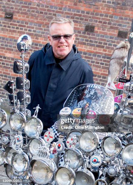 Graham McPherson aka Suggs with a scooter belonging to a member of the Croxley Rebels Scooter Club after their Music Walk Of Fame Stone unveiling,...