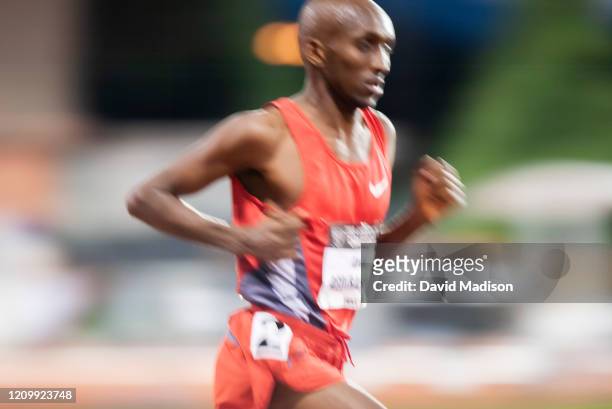 Abdi Abdirahman of the USA competes in the Men's 10000 meter event of the 2003 USA Track and Field Outdoor Championships on June 19, 2003 at Stanford...