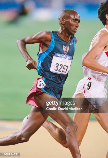 Abdi Abdirahman of the USA runs in the Men's 10000 meter Final of the 2000 Olympics run on September 25, 2000 in the Olympic Stadium in Sydney,...