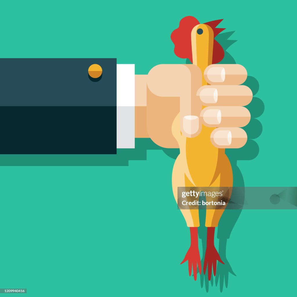 Hand Holding Rubber Chicken