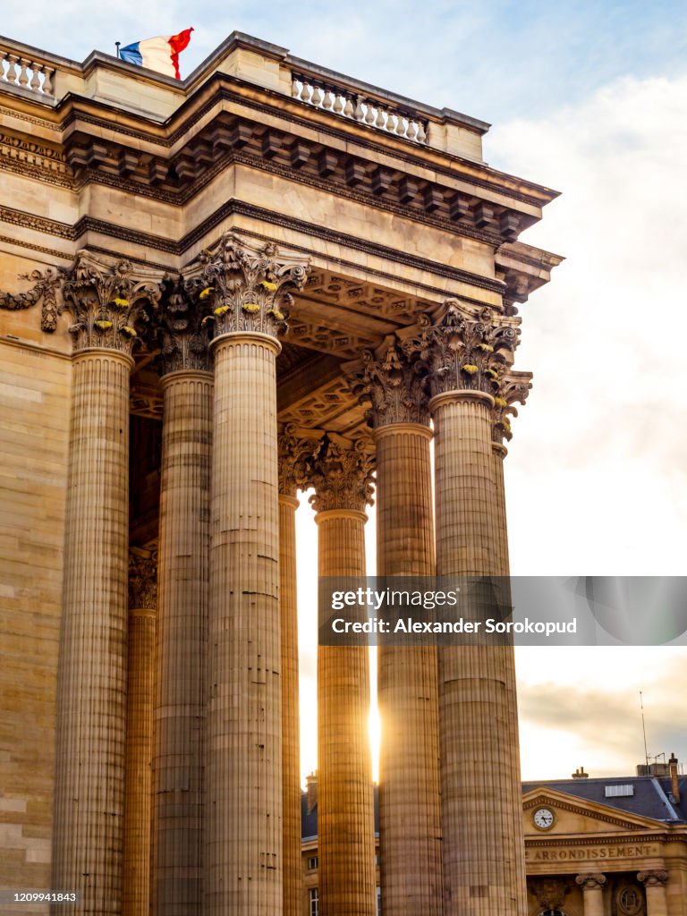 Pantheon building in Paris on a sunny day, sunset time. France