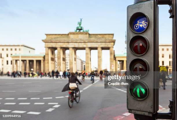 green traffic lights for cyclists at the brandenburger tor (brandenburg gate) - pariser platz stock pictures, royalty-free photos & images