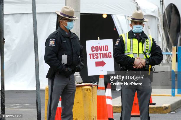 State troopers are posted at the entry point to the test site, in Brooklyn, New York, on April 14, 2020. Governor Andrew Cuomo announced that five...