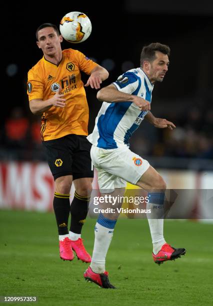 Daniel Podence of Wolverhampton Wanderers and Victor Sanchez of RCD Espanyol in action during the UEFA Europa League round of 32 first leg match...