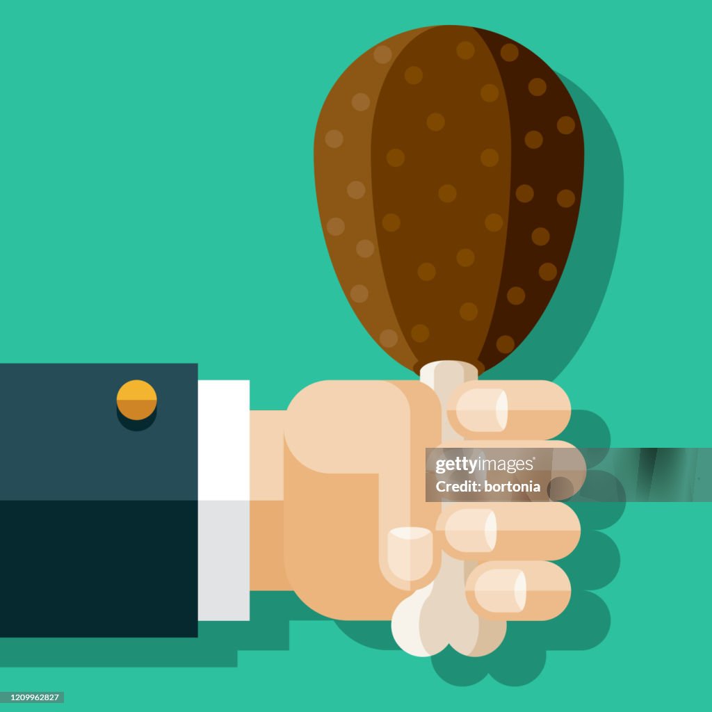 Hand Holding Meat on Bone