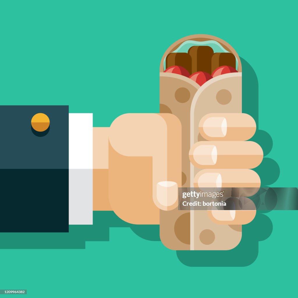 Hand Holding Shawarma