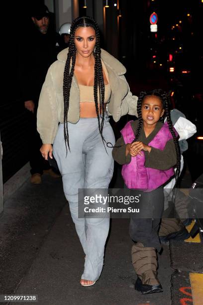 Kim Kardashian West and North West are seen arriving at a restaurant on March 02, 2020 in Paris, France.