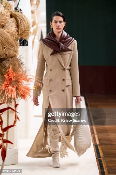 Model walks the runway during the Nanushka show as part of Paris Fashion Week Womenswear Fall/Winter 2020/2021 on March 01, 2020 in Paris, France.
