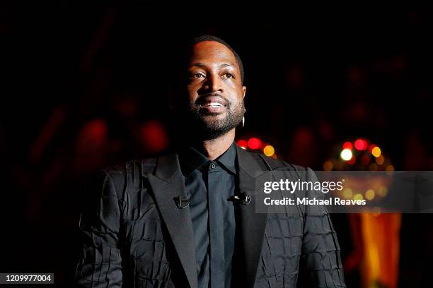 Former Miami Heat player Dwyane Wade addresses the crowd during his jersey retirement ceremony at American Airlines Arena on February 22, 2020 in...