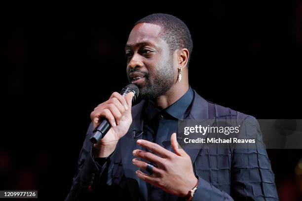 Former Miami Heat player Dwyane Wade addresses the crowd during his jersey retirement ceremony at American Airlines Arena on February 22, 2020 in...