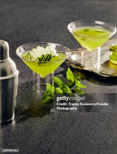 cucumber lime mint martini - cucumber cocktail stock pictures, royalty-free photos & images
