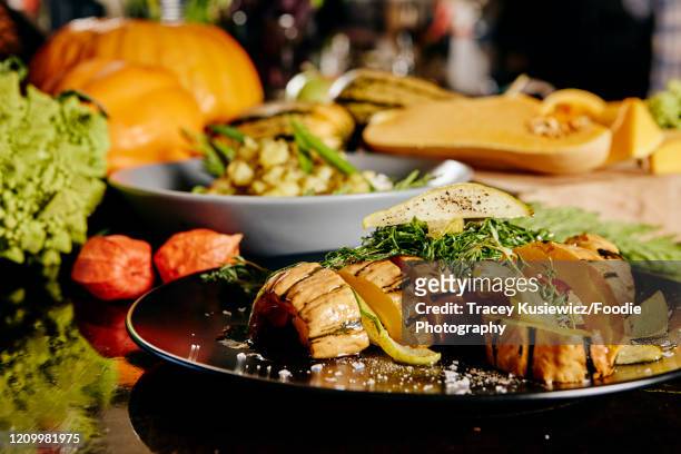 autumn delicata squash vegan dish - acorn squash stock pictures, royalty-free photos & images