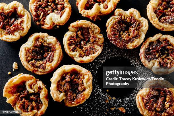maple pecan butter tarts - butter tart stock pictures, royalty-free photos & images