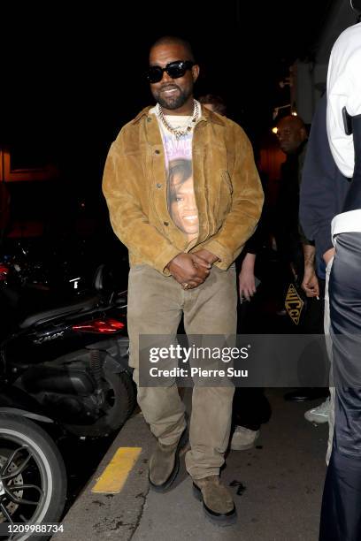 Kanye West is seen leaving a restaurant after his show on March 02, 2020 in Paris, France.