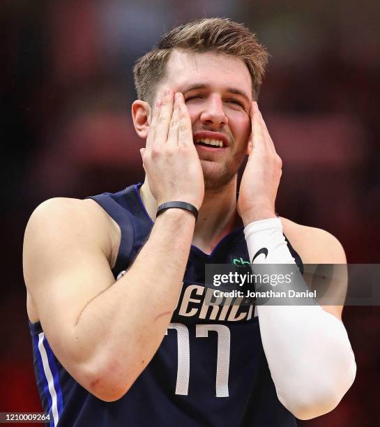 Luka Doncic of the Dallas Mavericks reacts after missing the game-winning shot in the final seconds against the Chicago Bulls at the United Center on...