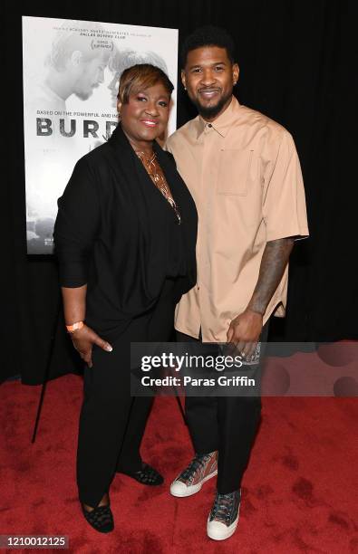 Singer Usher Raymond IV poses with his mother Jonetta Patton during "Burden" Atlanta Red Carpet Screening at The Plaza Theatre on March 02, 2020 in...