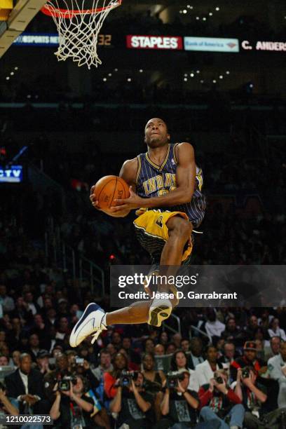 Fred Jones of the Indiana Pacers dunks the ball during the Dunk Contest at All Star Saturday Night as part of 2004 NBA All Star Weekend on February...