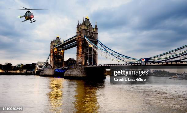 helicopter flying over london, united kingdom - helicopter photos stock pictures, royalty-free photos & images