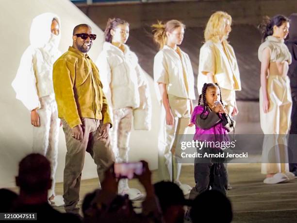 Kanye West and daughter North West attends the "Yeezy Season 8" show as part of the Paris Fashion Week Womenswear Fall/Winter 2020/2021 on March 02,...