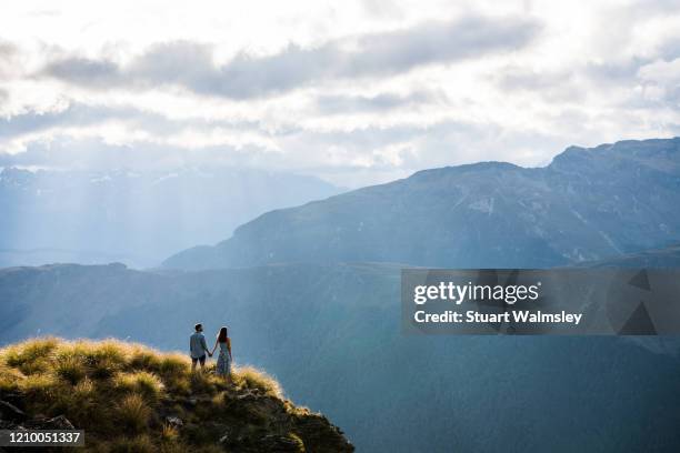 couple enjoy queenstown - otago landscape stock pictures, royalty-free photos & images