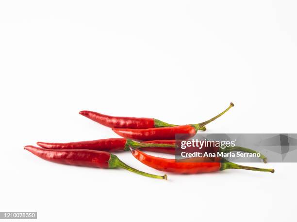 spicy peppers against white background - cayenne powder stock pictures, royalty-free photos & images