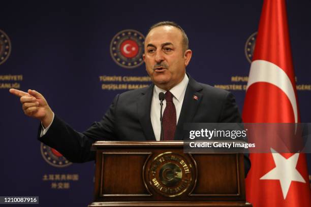 Minister of Foreign Affairs of Turkey, Mevlut Cavusoglu speaks at a joint press conferance after his meeting with British Foreign Secretary Dominic...