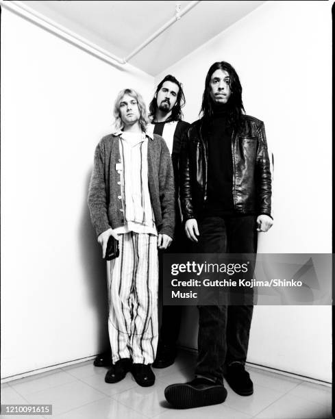 Nirvana, group portrait, backstage at Nakano Sunplaza, Tokyo, Japan, 19th December 1992. Kurt Cobain, Krist Novoselic, Dave Grohl.