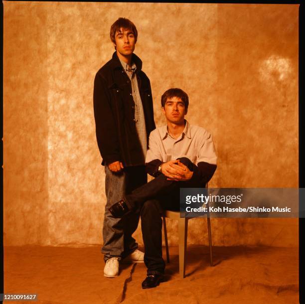 Liam Gallagher and Noel Gallagher of Oasis, at a photoshoot in a hotel in Tokyo, September 1994.