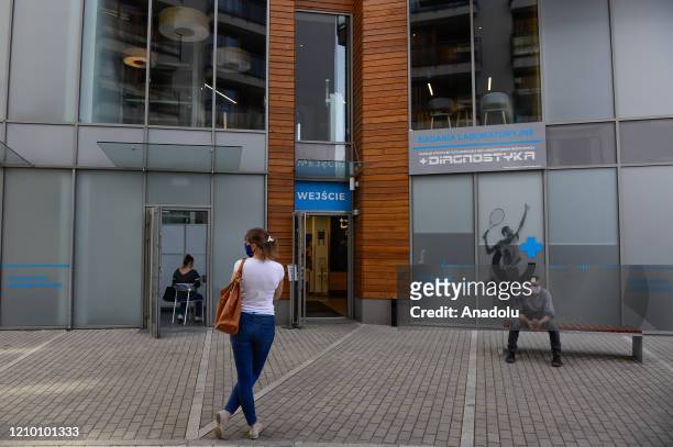 Patients wait outside for the results of antibody test for COVID-19 at the Dworska Hospital in Krakow, Poland on the April 16, 2020. The Chinese...