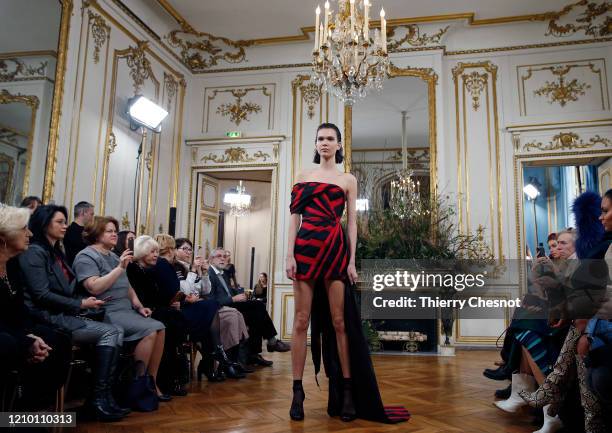 Model walks the runway during the Valentin Yudashkin as part of the Paris Fashion Week Womenswear Fall/Winter 2020/2021 on March 03, 2020 in Paris,...