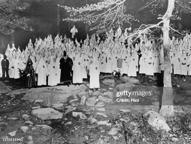 Ku Klux Klan meeting in a forest in Stone Mountain, Georgia, US, 17th September 1921.