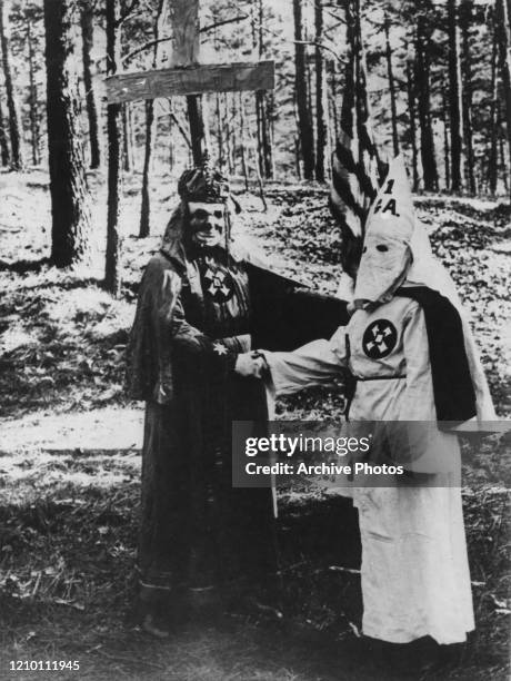 Two members of American white supremacist hate group Ku Klux Klan, US, circa 1920.