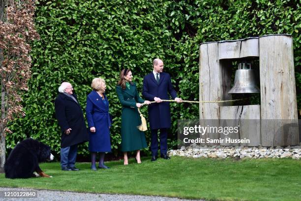 President of Ireland Michael D. Higgins and his wife Sabina Coyne watch as Catherine, Duchess of Cambridge and Prince William, Duke of Cambridge ring...