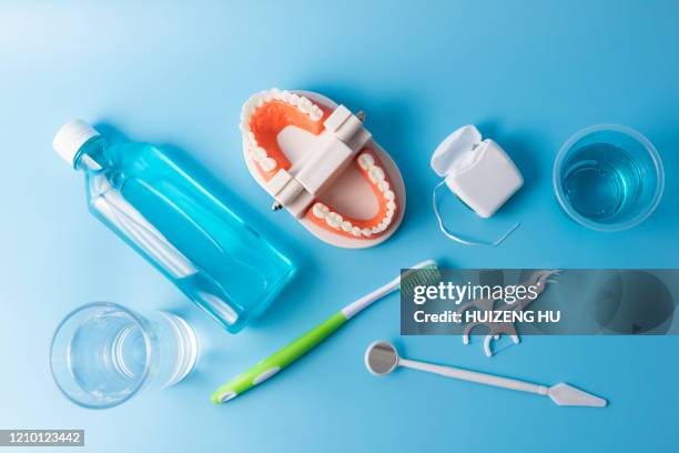 dental care equipment - zahnseide stock-fotos und bilder