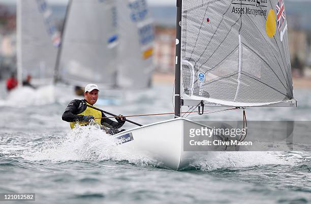 Ben Ainslie of Great Britain in action on his way to a gold medal in the Finn Class medal race on day twelve of the Weymouth and Portland...