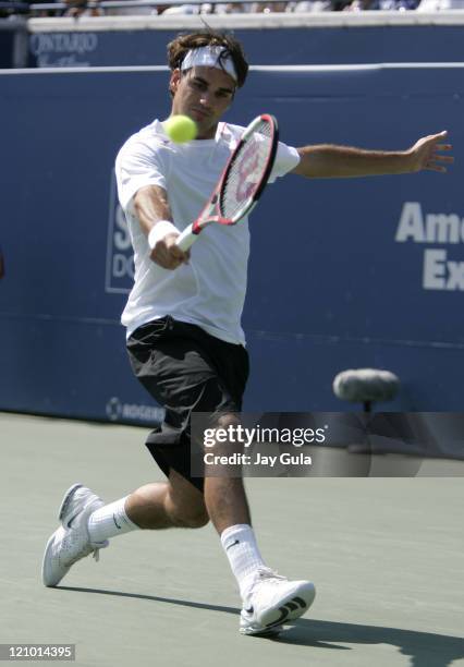 Top seeded Roger Federer of Switzerland in action during his 2nd round match against Sebastien Grosjean of France in the Rogers Cup at the Rexall...