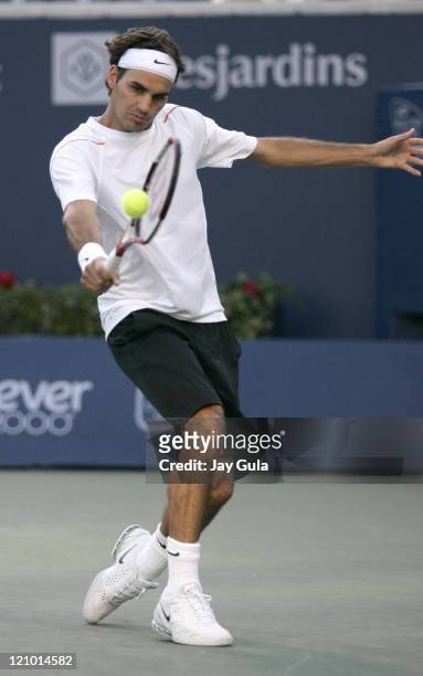 No.1 seed Roger Federer of Switzerland in action vs Xavier Malisse of Belgium at the Rogers Cup ATP Master Series tennis tournament at the Rexall...
