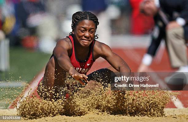 Stanford's Deborah Akinniyi hits the sand in the College Women's Triple Jump Championship Friday, April 28, 2006 during the 112th running of the Penn...