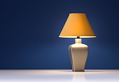 Yellow lamp on blue background - interior - 3d rendering