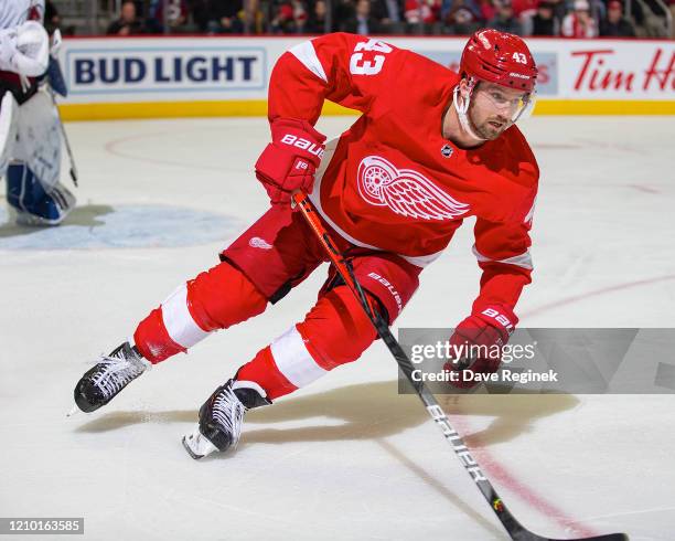 Darren Helm of the Detroit Red Wings turns up ice against the Colorado Avalanche during an NHL game at Little Caesars Arena on March 2, 2020 in...