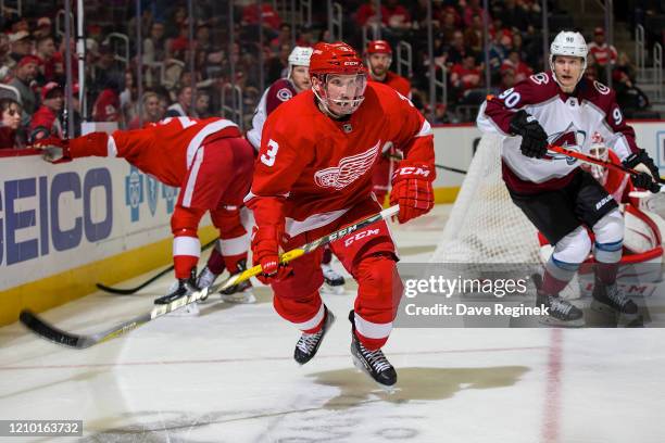 Alex Biega of the Detroit Red Wings skates after a loose puck against the Colorado Avalanche during an NHL game at Little Caesars Arena on March 2,...