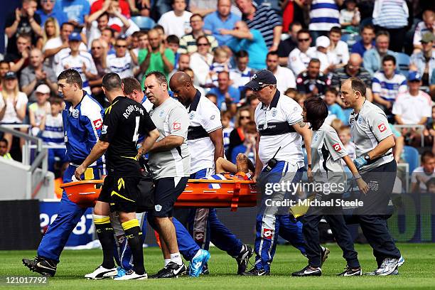 Kieron Dyer of Queens Park Rangers is stretchered off during the Barclays Premier League match between Queens Park Rangers and Bolton Wanderers at...