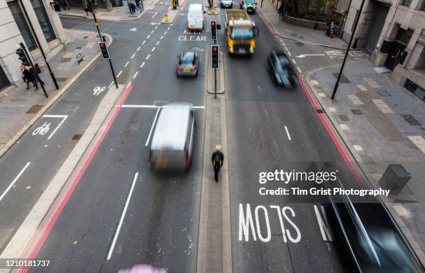 high angle view of traffic on a busy city street, london, uk - central london traffic stock pictures, royalty-free photos & images