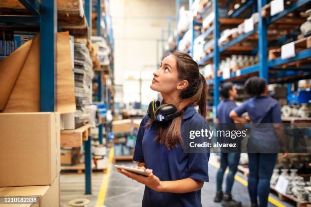 warehouse worker checking stock levels - searching stock pictures, royalty-free photos & images