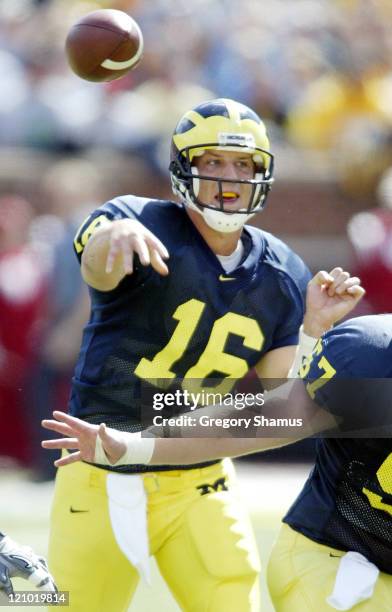 University of Michigan QB John Navarre throws a pass against Indiana during second quarter action at Michigan Stadium on September 27, 2003. Michigan...